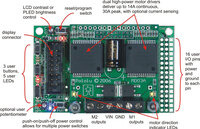 Pololu Orangutan X2 Robot Controller, top view with top and bottom board and labels (power capacitor orientation may vary).
