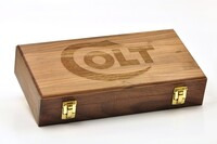 Laser-engraved walnut handgun case.