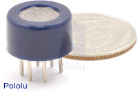 Gas sensor with blue plastic case with quarter for size reference.