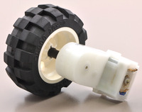 2mm shaft adapter connecting a LEGO wheel to a 120:1 mini plastic gearmotor with offset output.