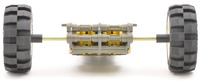 3mm hexagonal shaft adapter connecting a Tamiya twin-motor gearbox to two LEGO wheels.