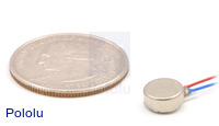 Shaftless vibration motor 8×3.4mm with quarter for size reference.