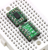 Two MMA7361L/MMA7341L 3-axis accelerometers plugged into a breadboard.