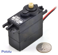 GWS S04 BBM large servo with U.S. quarter for size reference.