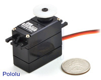 GWS S03N standard servo with U.S. quarter for size reference.