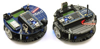 ARM’s original m3pi (left) next to Pololu’s m3pi robot (right).