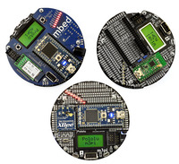 Top view of a group of m3pi robots: ARM’s original m3pi (left) and Pololu’s m3pis (right and bottom).