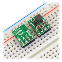 Pololu step-down voltage regulators D24VxFx in a breadboard.