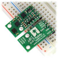 Two Pololu AltIMU-10 v3 modules in a breadboard.