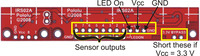 QTR-8x reflectance sensor array with 11×1 connection pins labeled.
