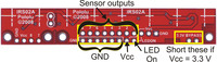 QTR-8x reflectance sensor array with 8×2 connection pins labeled.