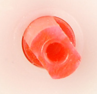 Close-up view of the output shaft of the BCM 60:1 Gear Motor Offset Output.